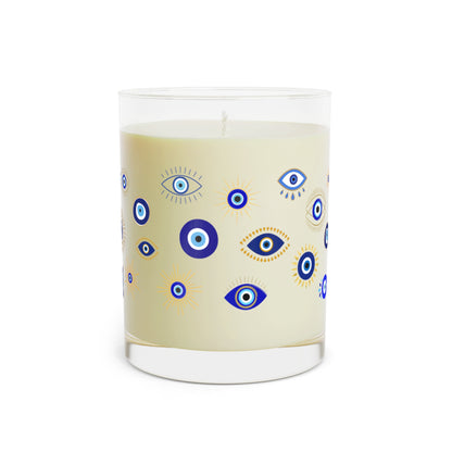 Candle with evil eye pattern design on a white background