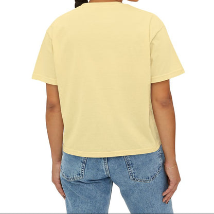Woman wearing a yellow t-shirt and blue jeans on a white background