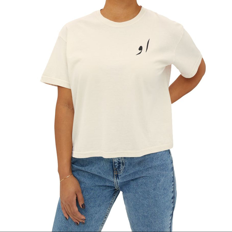 beige shirt with Farsi persian writing of او on the chest.