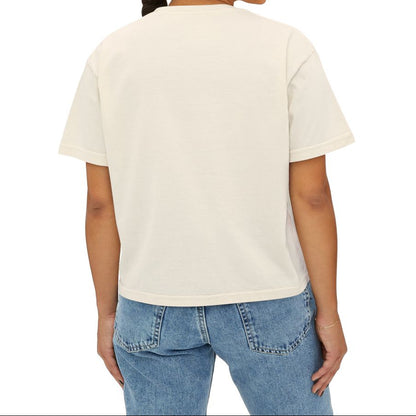 Woman wearing a plain white t-shirt and blue jeans on a white background