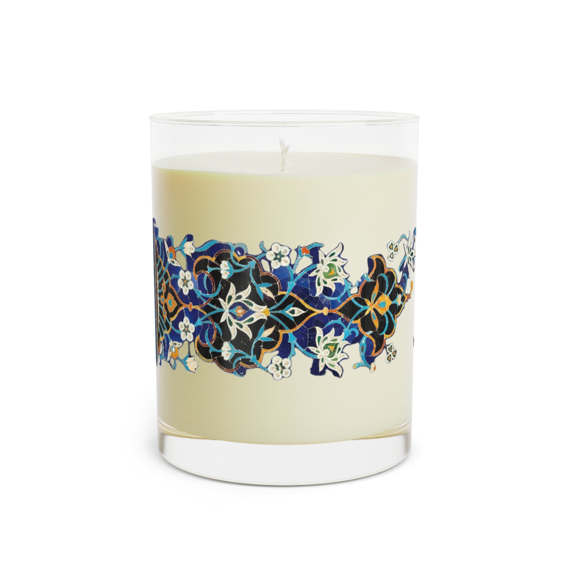 Candle with decorative label on a white background