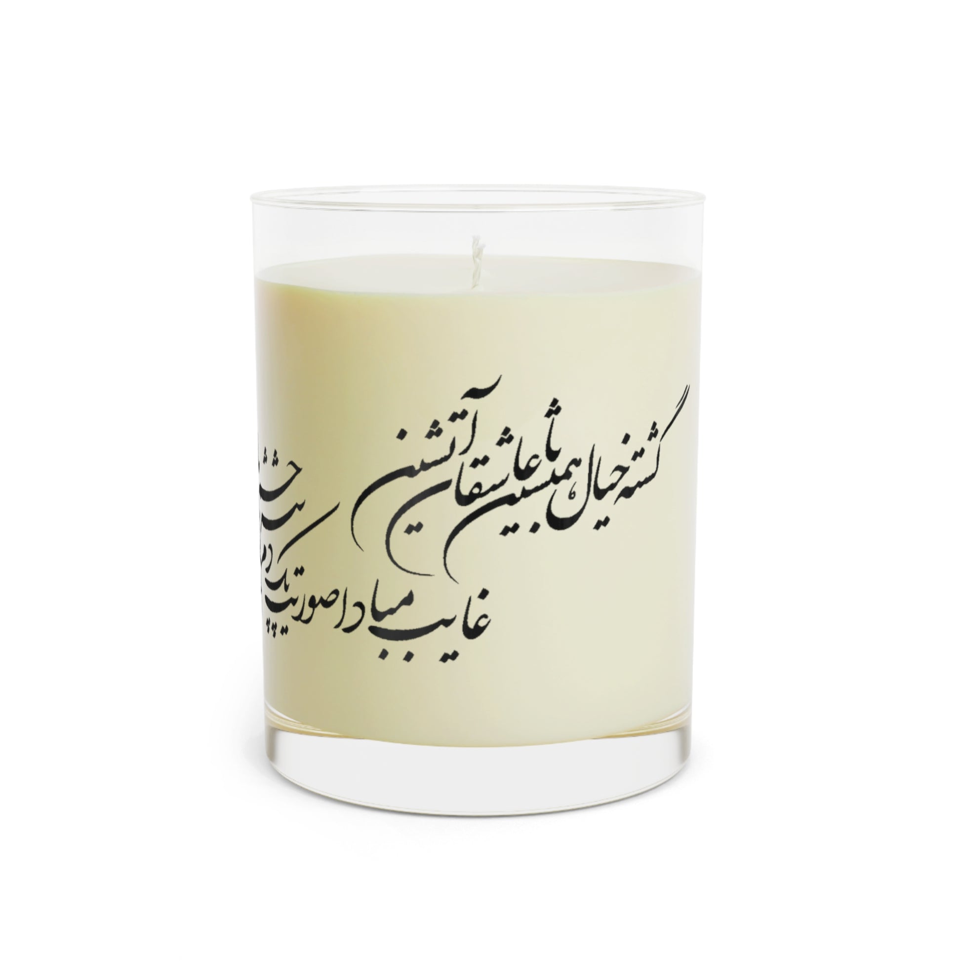 Candle with farsi text on a beige label against a white background