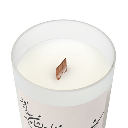 White candle with a wooden wick on a white background