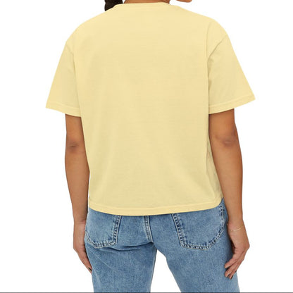 Woman wearing a yellow t-shirt and blue jeans on a white background