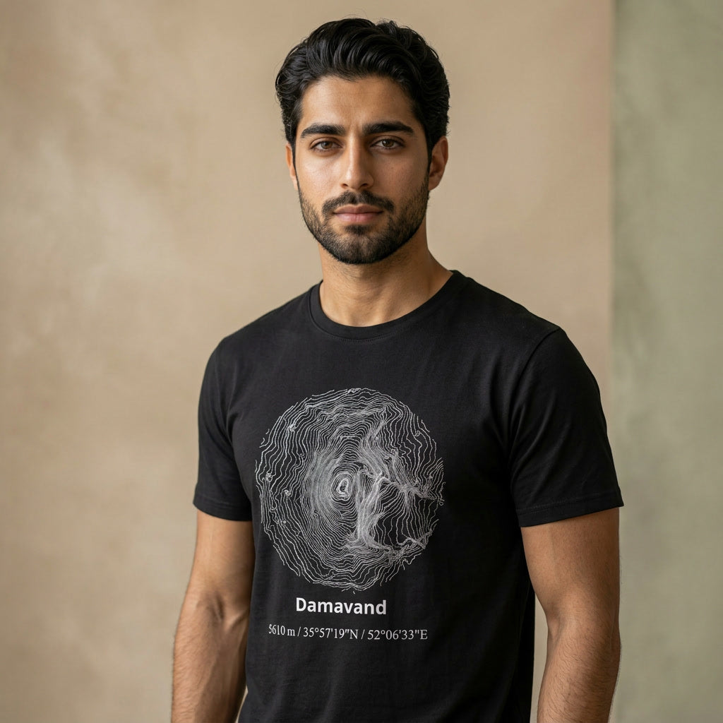 Man wearing a black t-shirt with a graphic design and text against a beige background