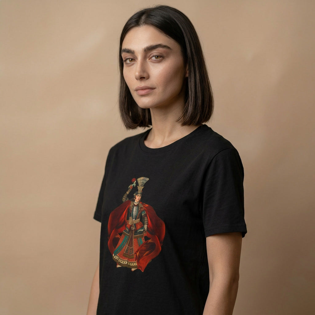 Woman wearing a black t-shirt with a graphic design of a qajar art on a beige background